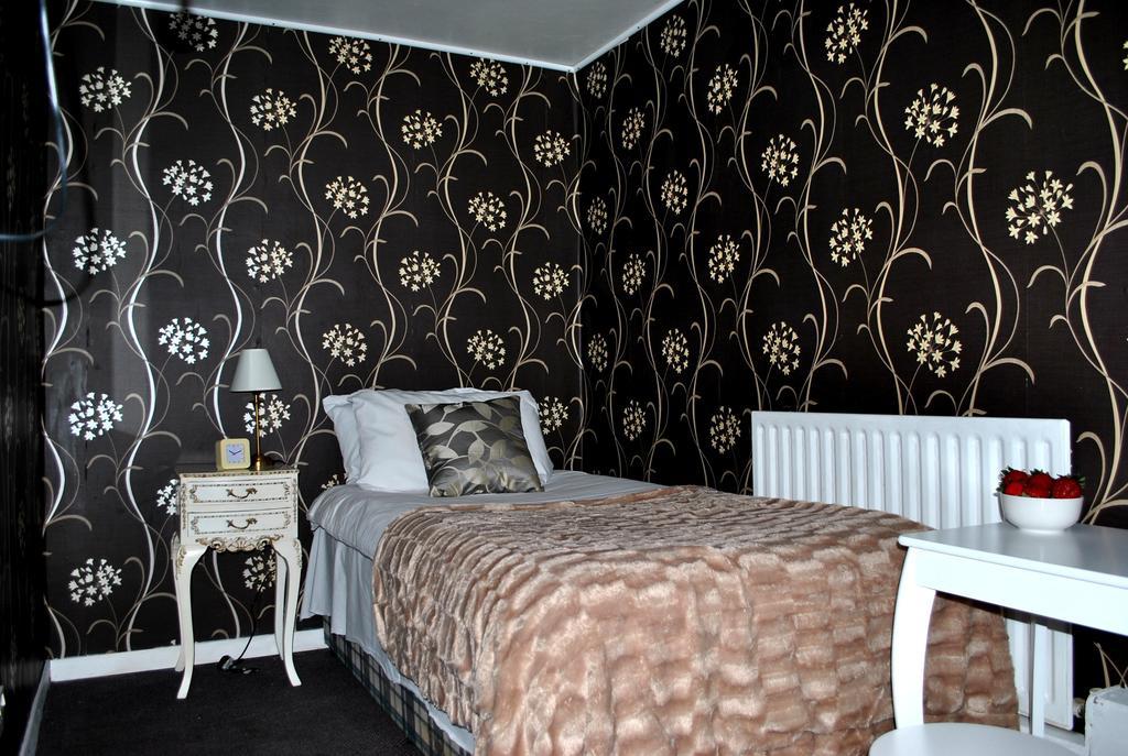 Amber Guesthouse Дербі Номер фото
