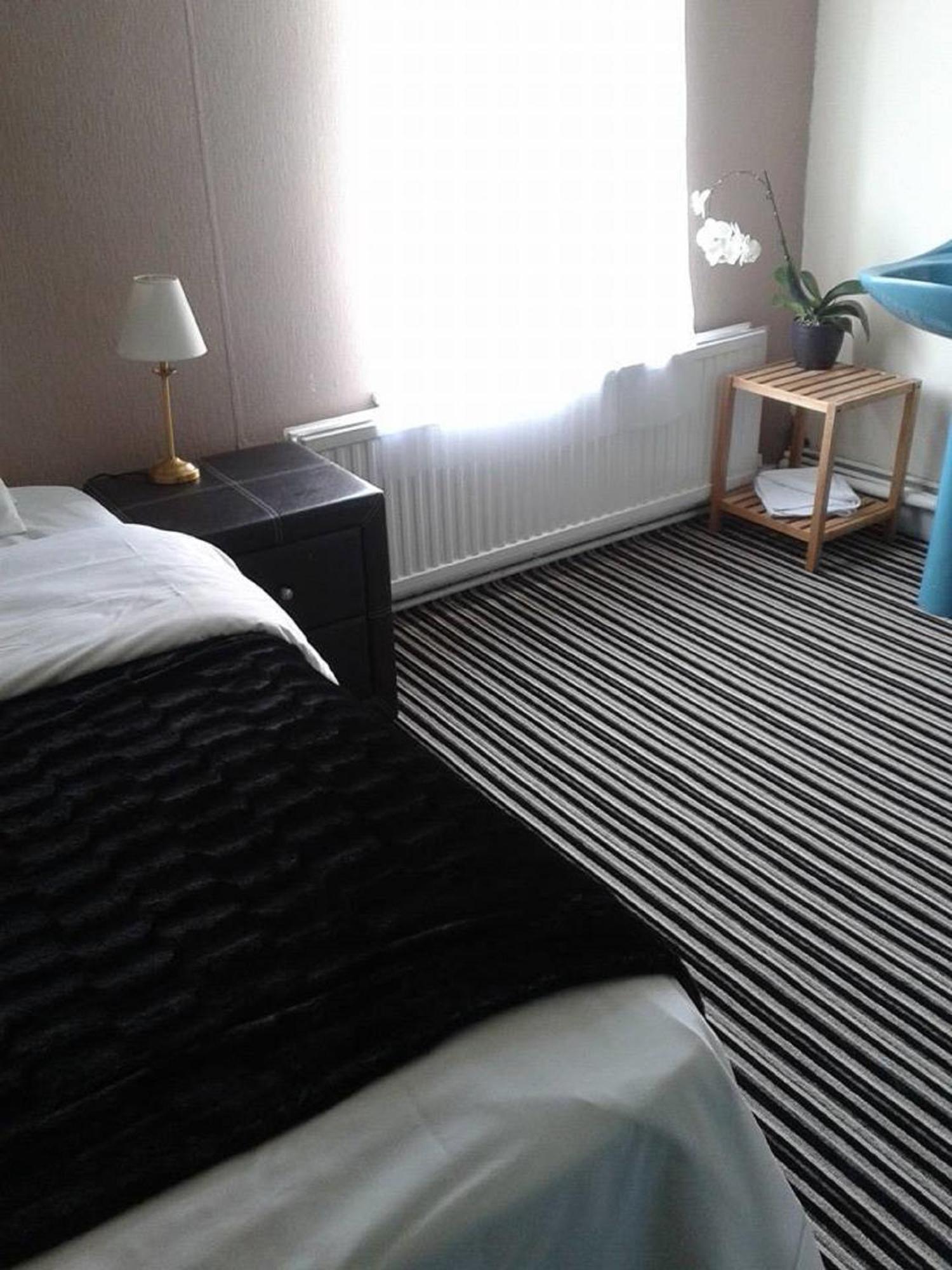 Amber Guesthouse Дербі Номер фото